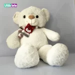 عروسک خرس سفید مدل شال گردنی تدی 8۰ سانتیمتر 1 عروسک خرس سفید مدل شال گردنی تدی 8۰ سانتیمتر